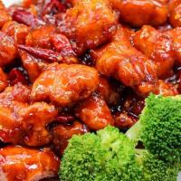 Q16. General's Tso Chicken 左中鸡 · Spicy. Served with house salad.
