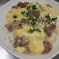 Beef w/ Egg Gravy over Rice 滑蛋牛肉飯 · Spicy. 滑蛋牛肉飯