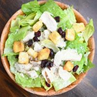 Chicken Caesar Cranberry Salad · Romaine Lettuce, Croutons, Chicken, Cranberries, and Caesar Dressing.