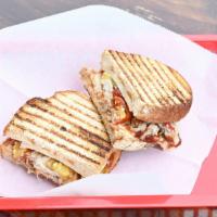 BBQ Puuled Pork Panini · Roasted Pork, House made BBQ sauce, Jack Cheese, Cherry Peppers!