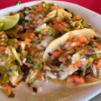 Tacos Gringos · Tres tacos de tortilla hecha a mano con su elección de carne y pico de gallo. / Three handma...