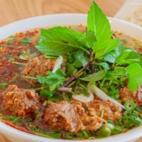 Spicy Beef Ball Pho · Plant-based beef balls in aromatic spicy vegetable broth with pho noodles (made from rice) t...