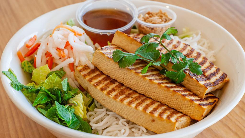 Grilled Organic Tofu · Your choice of rice or noodles comes with organic romaine heart lettuce, bean sprouts, shredded cucumber, Vietnamese vegetable pickles, topped with chopped roasted peanuts served with vinaigrette gluten free soy sauce.