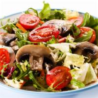 Dinner Salad · Fresh lettuce, olives, tomatoes and mushrooms.