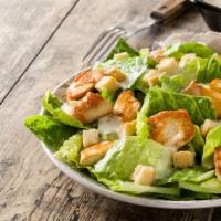 The Caesar Salad · Fresh salad made with crisp romaine lettuce and house-made garlic croutons tossed in a cream...