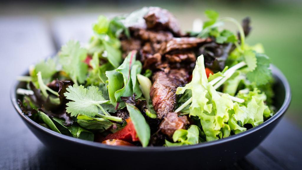 Beef Gyro Salad · Delicious beef gyro with seasoned mixed greens, cucumbers, tomatoes, olives, lemon juice and olive oil.
