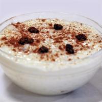 Arroz Con Leche · Delicious rice pudding made from rice mixed with milk and topped with cinnamon. (7oz)
