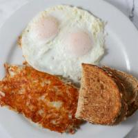2 Eggs Any Style · Served with hash browns and toast.