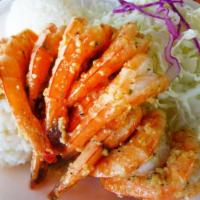 Garlic Shrimp · Nine juicy shrimps, sauteed in garlic & spices, served over a bed of white rice, fried rice,...