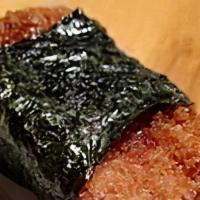 Chicken Katsu Musubi (1 Pc.) · An island classic composed of a slice of chicken katsu on rice, wrapped in dried seaweed.