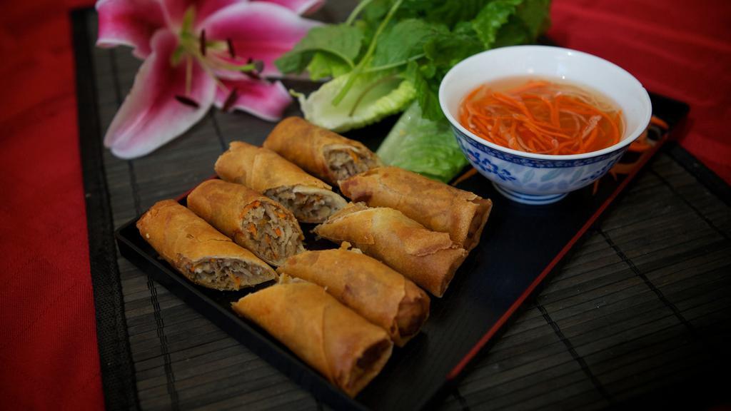 1. Egg Rolls (4) · Deep fried rolls wrapped in rice paper and filled with pork, clear, vermicelli noodles & vegetables served with Asian greens & fish sauces.