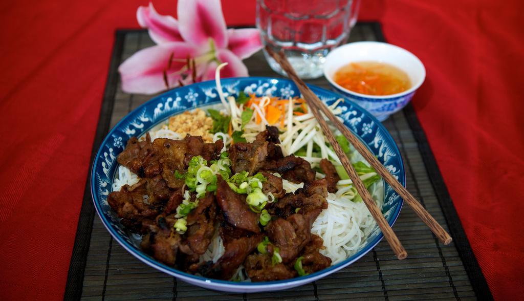 33. Grilled Pork · Dish includes peanuts. Grilled pork marinated with our Le Paradis house sauce, served with white vermicelli noodles and vegetables. Topped with peanuts & onions.