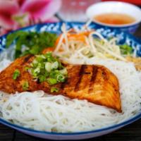 36. Grilled Salmon · Grilled salmon marinated with Le Paradis house sauce, served with white vermicelli noodles a...