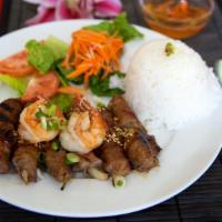 50. Grilled Beef & Shrimp · Grilled beef wrapped with onions and marinated with Le Paradis house sauce, grilled shrimp a...