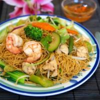 65. Combination Egg Noodle Chow Mein (Chicken, Shrimp, Beef) · Stir-fry egg noodles with vegetables and chicken, beef and shrimp. (Egg Noodle Only)  No whi...