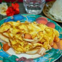 69. Egg Omelette with Tomato and Shrimp · Saute shrimp, onions, and tomatoes wrapped in an egg omelette.
