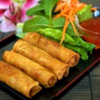 70. Vegetarian Fried Egg Rolls (4) · Deep fried egg rolls made from rice paper onion, taro, carrot, served with sweet chili sauce.