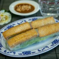 71. Tofu Fresh Spring Rolls (2) · Dish includes peanuts. Fried organic tofu in rice paper with vermicelli, lettuce, chives min...