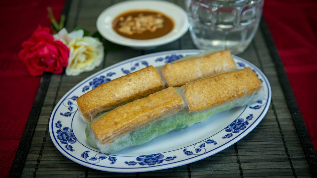 71. Tofu Fresh Spring Rolls (2) · Dish includes peanuts. Fried organic tofu in rice paper with vermicelli, lettuce, chives mint, bean sprouts, served with peanut or fish sauce.