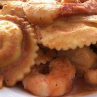 Seafood Ravioli · Lobster and cheese ravioli, shrimp, scallop and langostino meat with tomato cream sauce.

It...