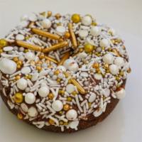 Psycho Donuts: Nutella the Money Hun · Chocolate cake donut with Nutella, topped with sprinkles.