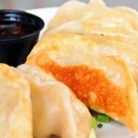 Pot Stickers · Pork, vegetables, ginger-soy dipping sauce.