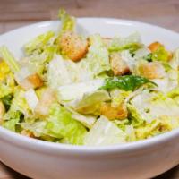 Caesar Salad · Romaine hearts, parmesan, garlic butter croutons.