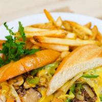 Philly Cheesesteak · Thinly sliced sirloin, onion, bell pepper, mushroom, provolone cheese, cheese sauce, soft ho...