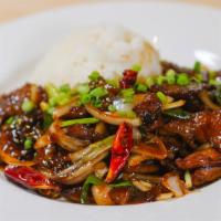 Mongolian Beef · Thinly sliced beef, onions, garlic, ginger, red chilies, green onions, jasmine rice.