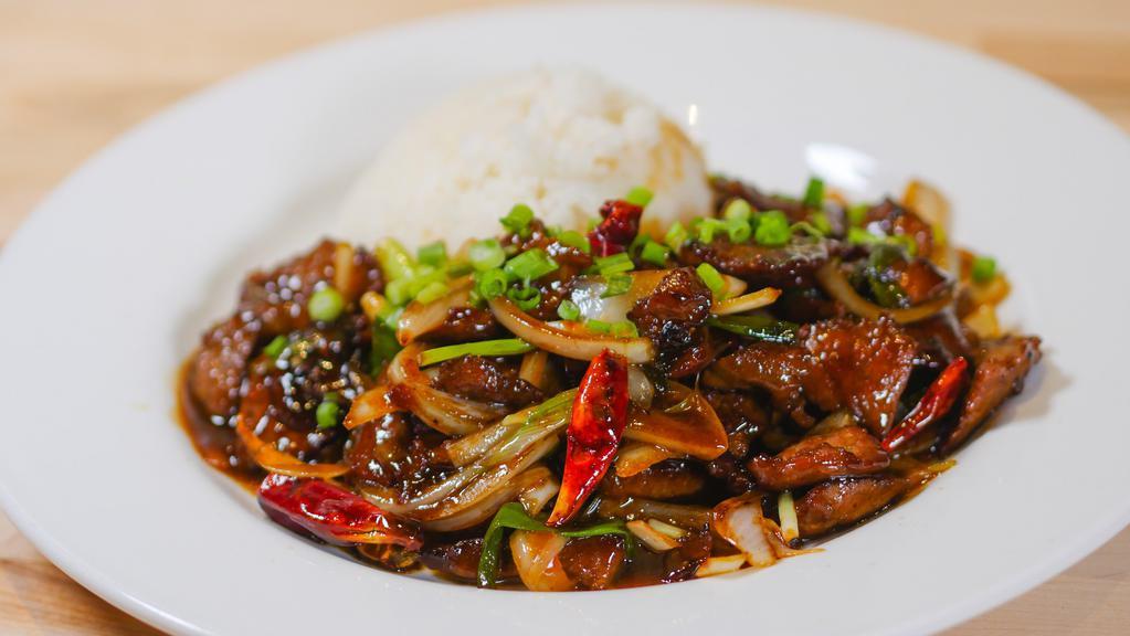 Mongolian Beef · Thinly sliced beef, onions, garlic, ginger, red chilies, green onions, jasmine rice.