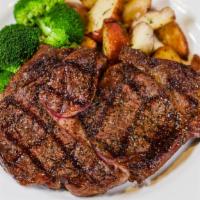 King's Cut Ribeye Steak · Gluten - free.  Grilled 16 ounce cut, choice of two sides.
