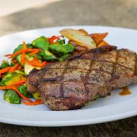 New York Steak · Gluten - free.  Grilled 9 ounce cut, choice of two sides.