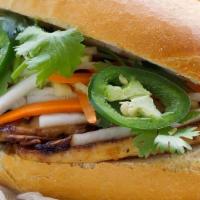 Chicken Sandwich · Grill  chicken, pickled carrot, daikon, lettuce, cilantro, halapeno