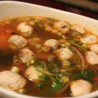 Tom Yum · Spicy. Hot and sour soup, tomatoes, lemon grass, fresh mushrooms, red onions, and galangal (...