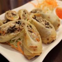 Por-Pier Pak (Vegetarian Egg Rolls) · Deep fried egg rolls (4) stuffed with silver noodle, tofu, and vegetables. Served with sweet...