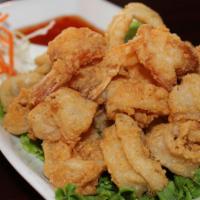 Koo Ruk (Fried Shrimp and Calamari) · Deep fried shrimp and calamari. Served with sweet and sour sauce.