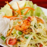 Som Tum Thai (Papaya Salad with Dried Shrimp) · Spicy, gluten free. Shredded green papaya salad with dried shrimp, tomatoes, green beans, ca...