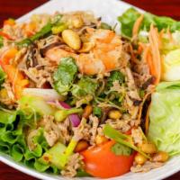Yum Ruam Mit Talay (Seafood Salad) · Spicy. Combination seafood salad mixed with onions and chili in lime dressing.