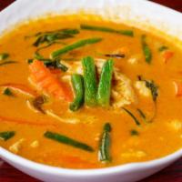 Gang Panang · Gluten free, spicy. Red curry with peanut sauce, green beans, red bell peppers, carrots, and...