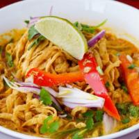 Chaing Mai Noodles (Kao Soy Thai) · Egg noodles served in light yellow curry soup with chicken, pickled mustard greens, and red ...