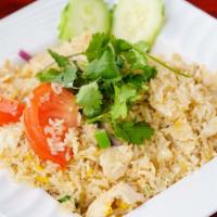 Kao Pad · Thai style fried rice with tomatoes, eggs and onions with choice of beef, chicken, or pork.