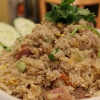 Kao Pad Nam Prig · Thai style fried rice with shrimp paste, shrimp, eggs, broccoli, onions, and chili.
