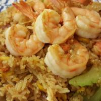 Kao Pad Goong Ga-Ree · Fried rice with yellow curry powder, shrimp, onions, celery, and egg served with cucumber sa...