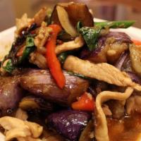 Pad Ma Kuer · Spicy. Sauteed eggplants, red bell peppers, onions, and basil with choice of chicken, beef o...