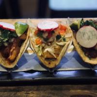 Taco Trio · 3 Tacos to try the variety of the Yucatan. Tacos may include onions, cilantro, pico de gallo...