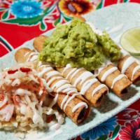 Crispy Chicken and Cheese Taquitos  · Pulled chicken, roast onions, American cheese.  Served with sour cream, guacamole, and cabba...
