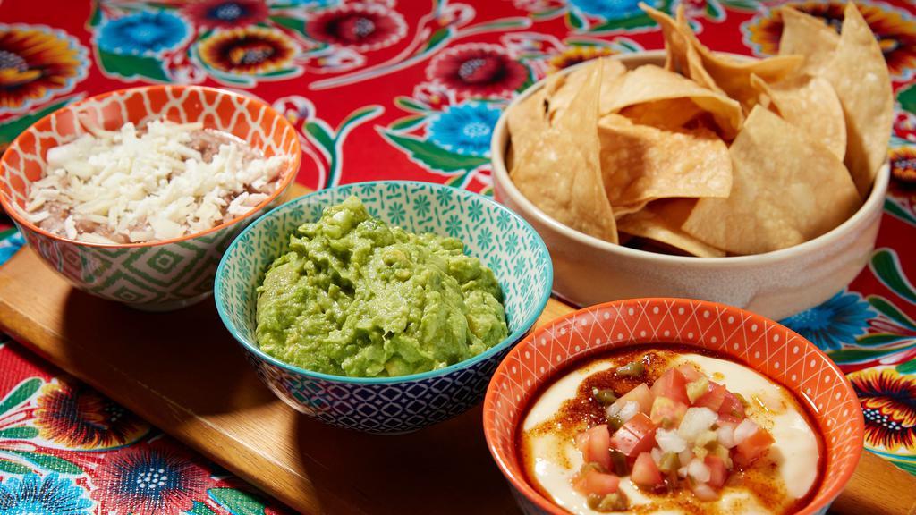 The 3 Amigos · House guacamole, queso dip, & Allie's bean dip. Served with house chips.