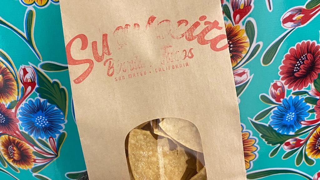Bag of Handcut Tortilla Chips  · Tossed with sea salt. 

vegan, gf, df

our chips share a fryer with other gluten & dairy items.