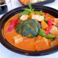 27. Pumpkin Curry · Pumpkin, red curry sauce, bell pepper, sweet basil, coconut milk.