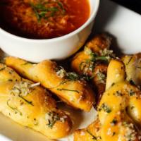 Garlic Parmesan Knots · choice of marinara or ranch dipping sauce